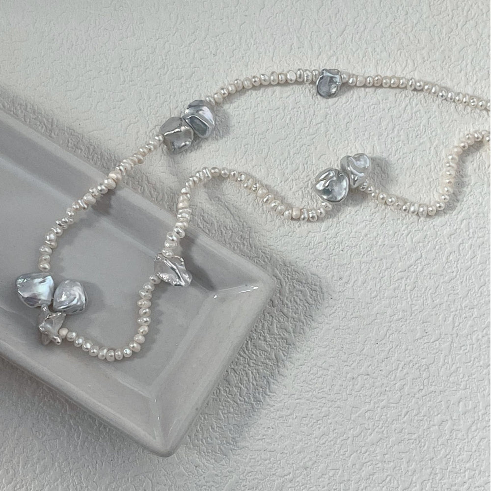 Handcrafted baroque necklace with unique pearls and delicate bead details for a stylish look