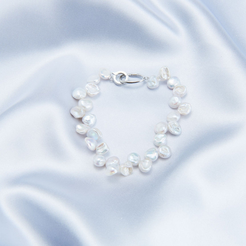 
                      
                        Keshi pearl bracelet featuring lustrous irregular pearls on a delicate chain
                      
                    