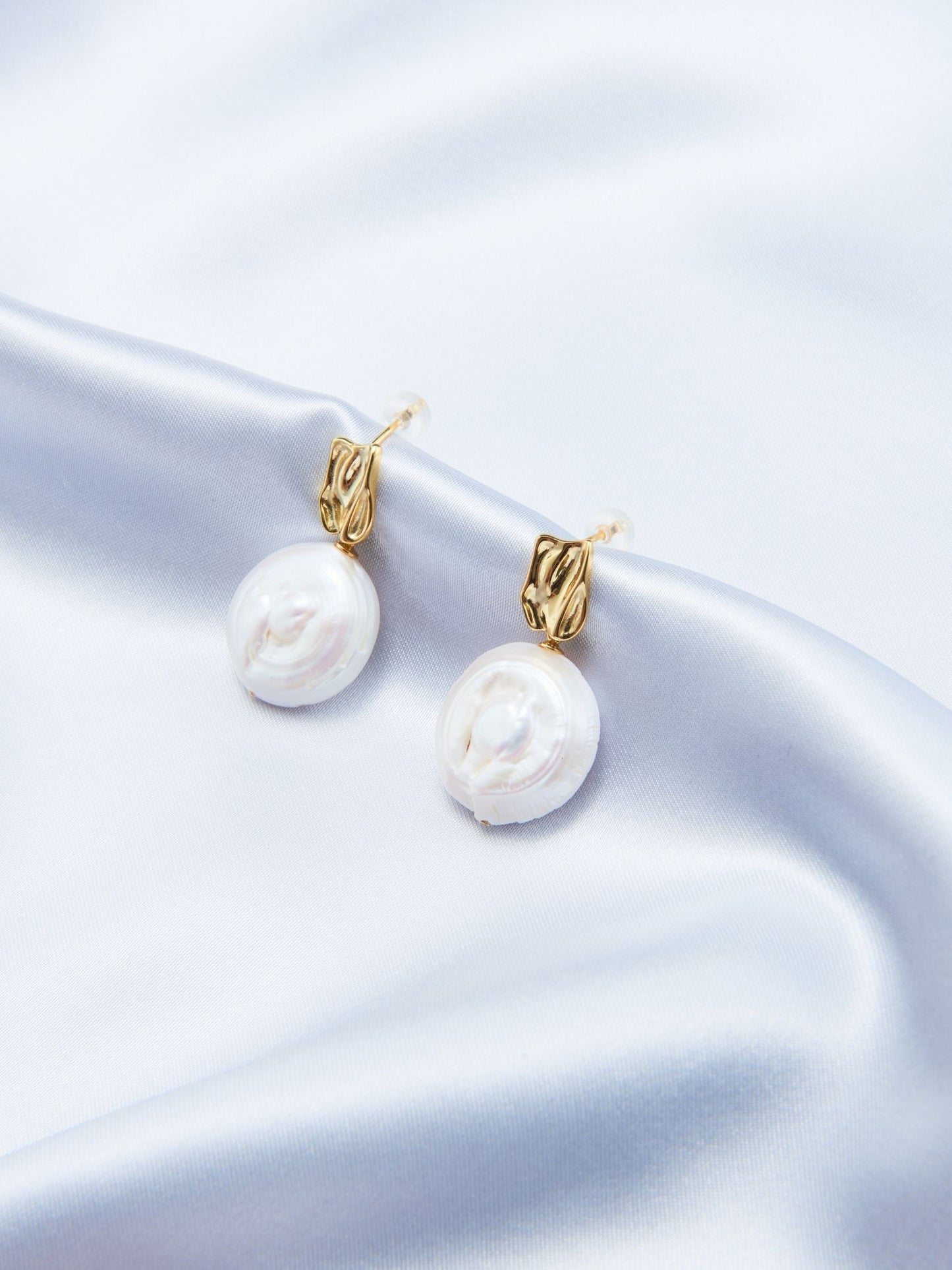 Pearlra modern baroque earrings featuring elegant gold accents and lustrous pearls