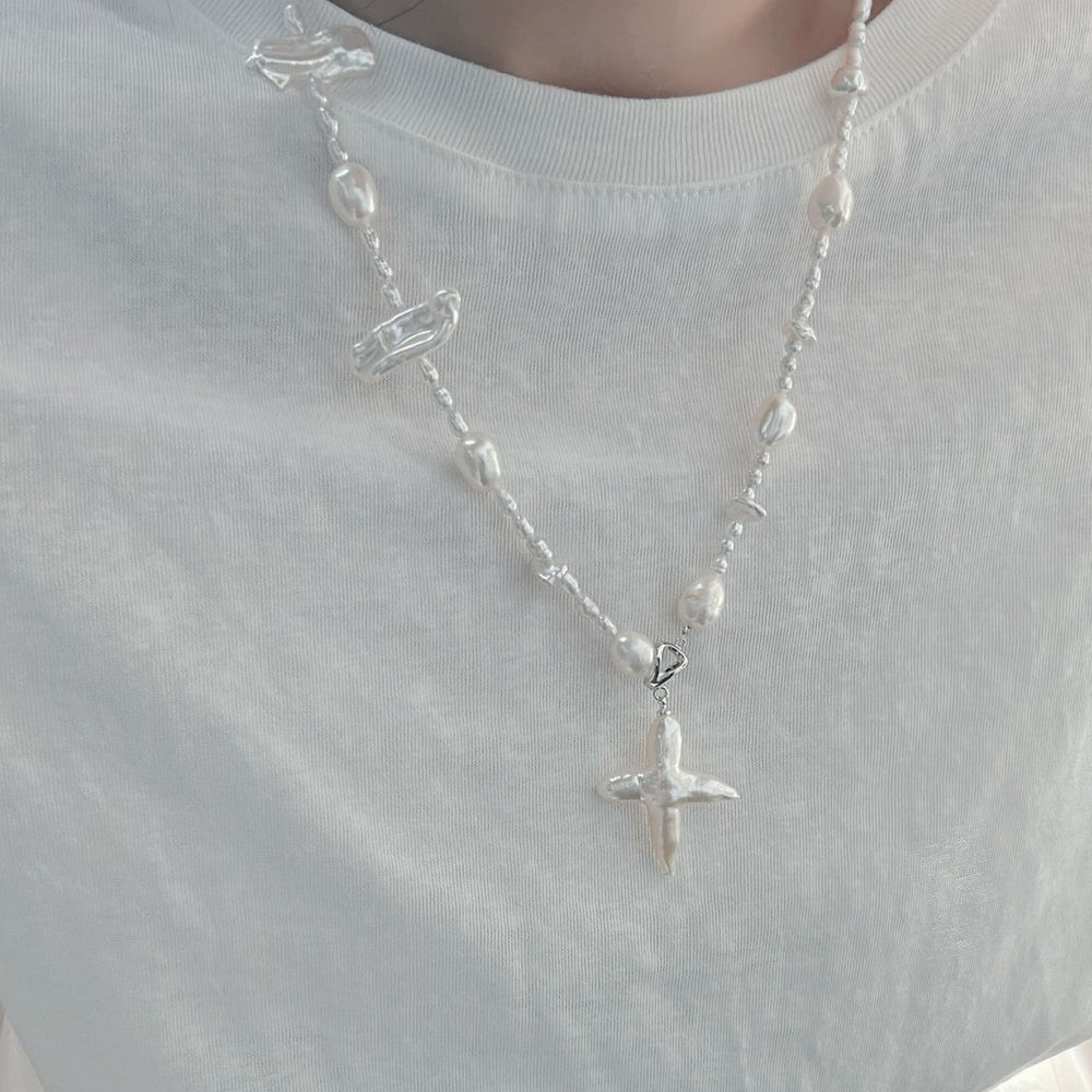 
                      
                        Pearlra stylish baroque cross pendant necklace featuring unique freshwater pearls and a modern design
                      
                    